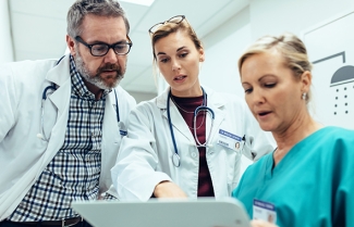 Healthcare team members reviewing results