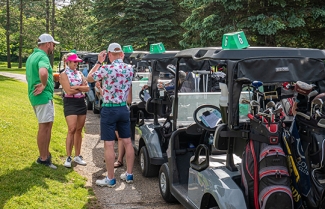 Golfers and golf carts