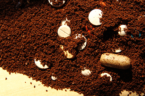 Pills mixed with coffee grounds for disposal
