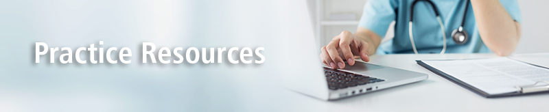 Healthcare worker on computer at desk