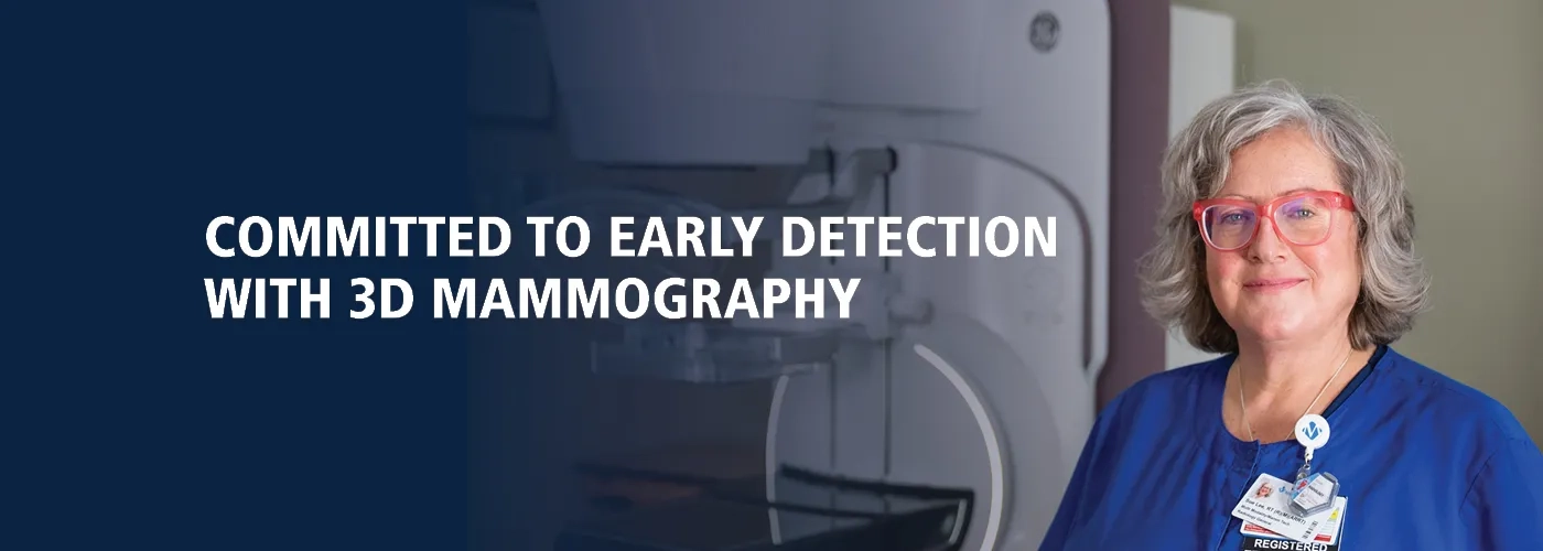 Mammographer in front of machine; text reading "Committed to early detection"