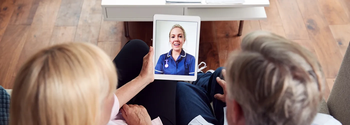Couple on video chat with healthcare provider